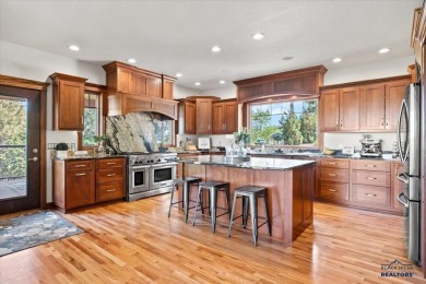 Tucked into nearly 3 acres of mature trees and peaceful hills on Spearfish Canyon Country Club in South Dakota - for sale on GolfHomes.com, golf home, golf lot
