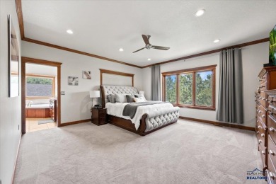 Tucked into nearly 3 acres of mature trees and peaceful hills on Spearfish Canyon Country Club in South Dakota - for sale on GolfHomes.com, golf home, golf lot