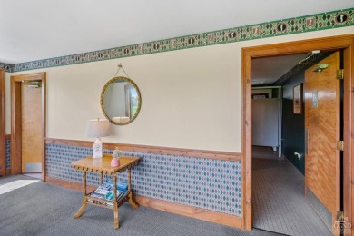 Own a piece of history with this unique mid-century modern on Winding Brook Country Club in New York - for sale on GolfHomes.com, golf home, golf lot