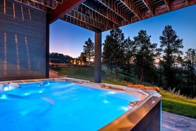 Tucked into nearly 3 acres of mature trees and peaceful hills on Spearfish Canyon Country Club in South Dakota - for sale on GolfHomes.com, golf home, golf lot