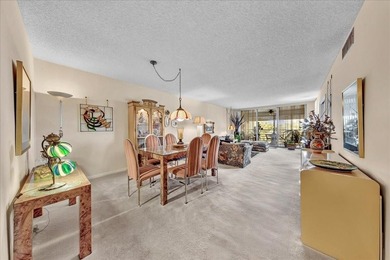 Turnkey Palm Aire condo w/ beautiful golf course views on Palm-Aire Country Club and Resort - Palms in Florida - for sale on GolfHomes.com, golf home, golf lot