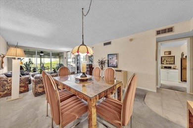 Turnkey Palm Aire condo w/ beautiful golf course views on Palm-Aire Country Club and Resort - Palms in Florida - for sale on GolfHomes.com, golf home, golf lot