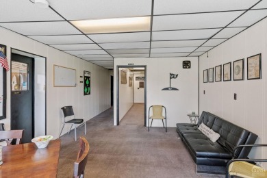 Own a piece of history with this unique mid-century modern on Winding Brook Country Club in New York - for sale on GolfHomes.com, golf home, golf lot