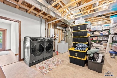 Tucked into nearly 3 acres of mature trees and peaceful hills on Spearfish Canyon Country Club in South Dakota - for sale on GolfHomes.com, golf home, golf lot