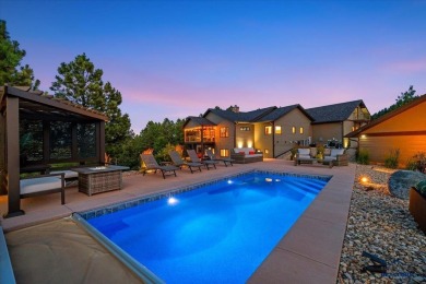 Tucked into nearly 3 acres of mature trees and peaceful hills on Spearfish Canyon Country Club in South Dakota - for sale on GolfHomes.com, golf home, golf lot