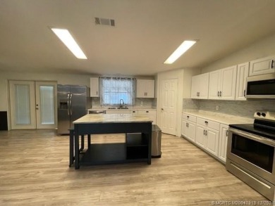 This home is gorgeous! Totally upgraded! Formal living, formal on Indianwood Golf and Country Club in Florida - for sale on GolfHomes.com, golf home, golf lot