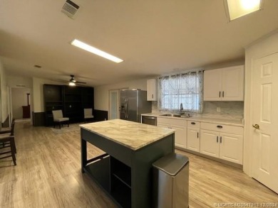 This home is gorgeous! Totally upgraded! Formal living, formal on Indianwood Golf and Country Club in Florida - for sale on GolfHomes.com, golf home, golf lot
