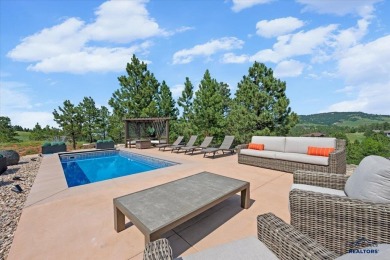 Tucked into nearly 3 acres of mature trees and peaceful hills on Spearfish Canyon Country Club in South Dakota - for sale on GolfHomes.com, golf home, golf lot