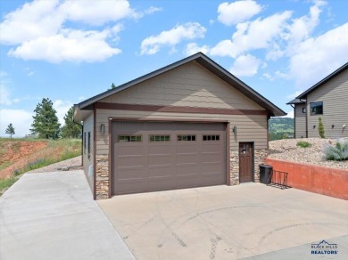 Tucked into nearly 3 acres of mature trees and peaceful hills on Spearfish Canyon Country Club in South Dakota - for sale on GolfHomes.com, golf home, golf lot