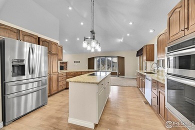 Sprawling brick ranch in the highly coveted Hawkstone on Eaton Country Club in Colorado - for sale on GolfHomes.com, golf home, golf lot