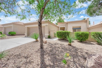 Charming 2-bedroom, 2-bath townhome with a 2-car garage, located on Eagle Crest Golf Club in Nevada - for sale on GolfHomes.com, golf home, golf lot