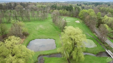 Own a piece of history with this unique mid-century modern on Winding Brook Country Club in New York - for sale on GolfHomes.com, golf home, golf lot