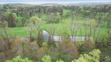 Own a piece of history with this unique mid-century modern on Winding Brook Country Club in New York - for sale on GolfHomes.com, golf home, golf lot