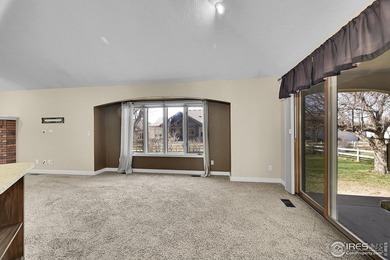 Sprawling brick ranch in the highly coveted Hawkstone on Eaton Country Club in Colorado - for sale on GolfHomes.com, golf home, golf lot