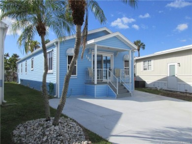 BEAUTIFUL, SPACIOUS CUSTOM SITE-BUILT (*STICK-BUILT*) 2 BEDROOM on Island Dunes Country Club in Florida - for sale on GolfHomes.com, golf home, golf lot