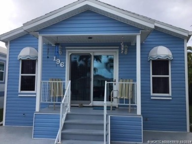 BEAUTIFUL, SPACIOUS CUSTOM SITE-BUILT (*STICK-BUILT*) 2 BEDROOM on Island Dunes Country Club in Florida - for sale on GolfHomes.com, golf home, golf lot