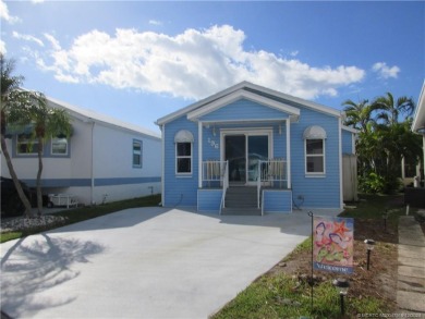 BEAUTIFUL, SPACIOUS CUSTOM SITE-BUILT (*STICK-BUILT*) 2 BEDROOM on Island Dunes Country Club in Florida - for sale on GolfHomes.com, golf home, golf lot