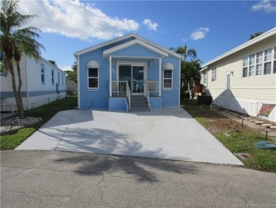 BEAUTIFUL, SPACIOUS CUSTOM SITE-BUILT (*STICK-BUILT*) 2 BEDROOM on Island Dunes Country Club in Florida - for sale on GolfHomes.com, golf home, golf lot