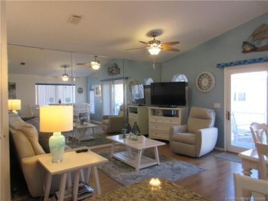 BEAUTIFUL, SPACIOUS CUSTOM SITE-BUILT (*STICK-BUILT*) 2 BEDROOM on Island Dunes Country Club in Florida - for sale on GolfHomes.com, golf home, golf lot