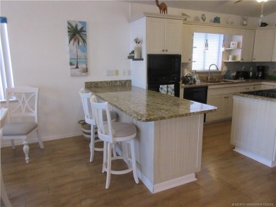 BEAUTIFUL, SPACIOUS CUSTOM SITE-BUILT (*STICK-BUILT*) 2 BEDROOM on Island Dunes Country Club in Florida - for sale on GolfHomes.com, golf home, golf lot