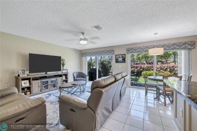 Located on the edge of Coral Springs FL, this unique home blends on The Carolina Club in Florida - for sale on GolfHomes.com, golf home, golf lot