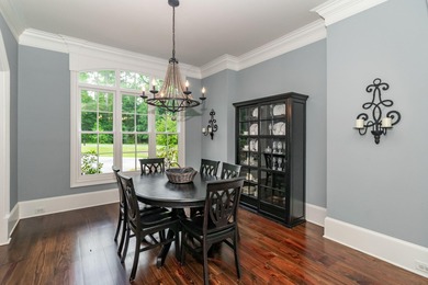 Gorgeous, stately all brick home situated on over an acre behind on Champions Retreat Golf Club in Georgia - for sale on GolfHomes.com, golf home, golf lot