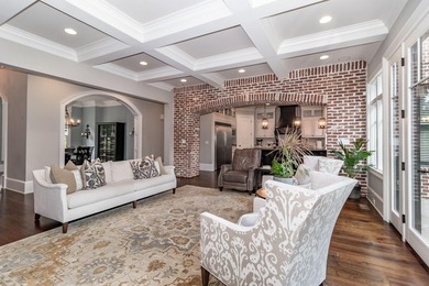 Gorgeous, stately all brick home situated on over an acre behind on Champions Retreat Golf Club in Georgia - for sale on GolfHomes.com, golf home, golf lot