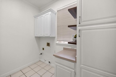 Situated along the golf course in prestigious Walnut Estates on Walnut Creek Country Club in Texas - for sale on GolfHomes.com, golf home, golf lot