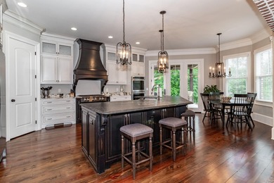 Gorgeous, stately all brick home situated on over an acre behind on Champions Retreat Golf Club in Georgia - for sale on GolfHomes.com, golf home, golf lot