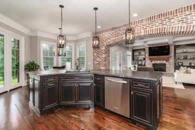 Gorgeous, stately all brick home situated on over an acre behind on Champions Retreat Golf Club in Georgia - for sale on GolfHomes.com, golf home, golf lot