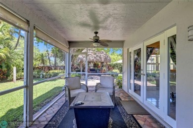 Located on the edge of Coral Springs FL, this unique home blends on The Carolina Club in Florida - for sale on GolfHomes.com, golf home, golf lot