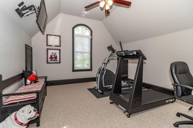 Gorgeous, stately all brick home situated on over an acre behind on Champions Retreat Golf Club in Georgia - for sale on GolfHomes.com, golf home, golf lot