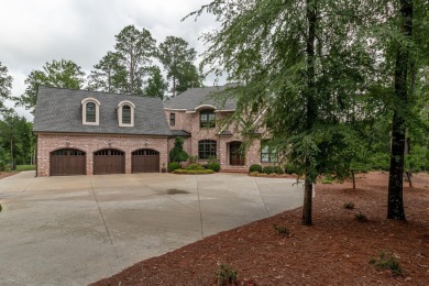 Gorgeous, stately all brick home situated on over an acre behind on Champions Retreat Golf Club in Georgia - for sale on GolfHomes.com, golf home, golf lot