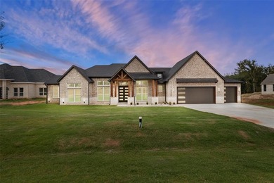 STUNNING 4-Bedroom Luxury Home in Pecan Plantation Golfing on Nutcracker Golf Club in Texas - for sale on GolfHomes.com, golf home, golf lot