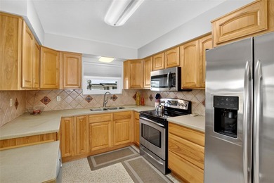 Charming Bungalow in Sun City Center - Move-In Ready & Fully on North Lakes Golf Course in Florida - for sale on GolfHomes.com, golf home, golf lot