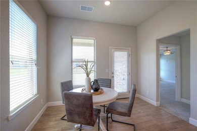 This affordable new home can be your first step to investing in on Heritage Park Golf Course in Kansas - for sale on GolfHomes.com, golf home, golf lot