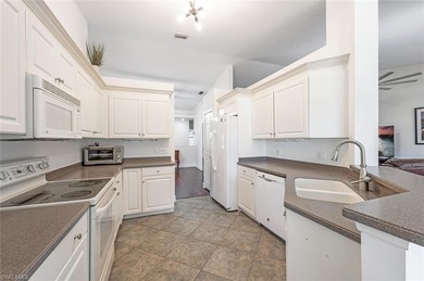 Rarely available 2nd floor end unit with PRIVATE ELEVATOR. Step on  in Florida - for sale on GolfHomes.com, golf home, golf lot