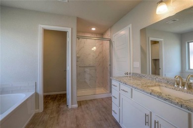 This affordable new home can be your first step to investing in on Heritage Park Golf Course in Kansas - for sale on GolfHomes.com, golf home, golf lot