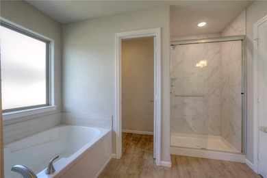 This affordable new home can be your first step to investing in on Heritage Park Golf Course in Kansas - for sale on GolfHomes.com, golf home, golf lot