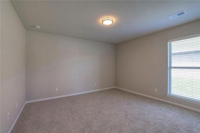 This affordable new home can be your first step to investing in on Heritage Park Golf Course in Kansas - for sale on GolfHomes.com, golf home, golf lot