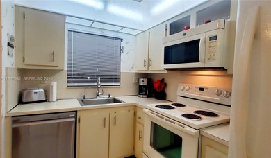 MUST SEE! Beautifully UPDATED TURNKEY, FULLY FURNISHED 3rd FLOOR on Sunrise Lakes Phase IV Golf Course in Florida - for sale on GolfHomes.com, golf home, golf lot