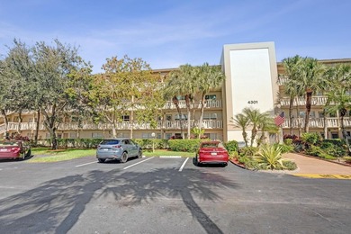 Discover this stunning top-floor 2-bed, 2-bath condo in the on Wynmoor Golf Course in Florida - for sale on GolfHomes.com, golf home, golf lot