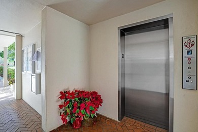 Discover this stunning top-floor 2-bed, 2-bath condo in the on Wynmoor Golf Course in Florida - for sale on GolfHomes.com, golf home, golf lot