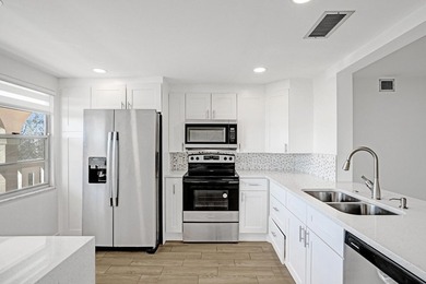 Discover this stunning top-floor 2-bed, 2-bath condo in the on Wynmoor Golf Course in Florida - for sale on GolfHomes.com, golf home, golf lot