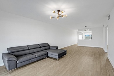 Discover this stunning top-floor 2-bed, 2-bath condo in the on Wynmoor Golf Course in Florida - for sale on GolfHomes.com, golf home, golf lot