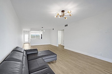 Discover this stunning top-floor 2-bed, 2-bath condo in the on Wynmoor Golf Course in Florida - for sale on GolfHomes.com, golf home, golf lot