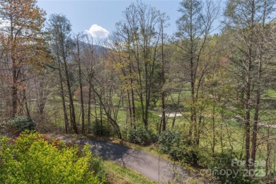 Live on this tranquil street, away from the hustle and bustle of on Maggie Valley Resort and Country Club in North Carolina - for sale on GolfHomes.com, golf home, golf lot