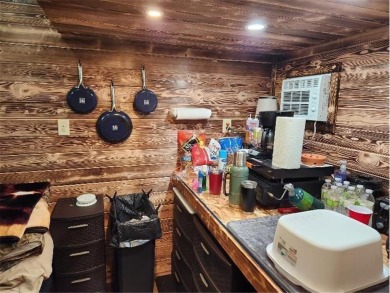 THIS IS THE AFFORDABLE WEEKEND RETREAT YOU'VE BEEN LOOKING FOR ! on Hardwoods Golf Club At Mille Lacs in Minnesota - for sale on GolfHomes.com, golf home, golf lot