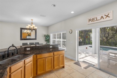 Live like you're on vacation--every single day! Located in the on Providence Golf Club in Florida - for sale on GolfHomes.com, golf home, golf lot