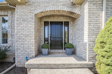 Welcome to this stunning 4-bedroom, 4-bathroom home situated on on Boulder Creek Golf Club in Michigan - for sale on GolfHomes.com, golf home, golf lot